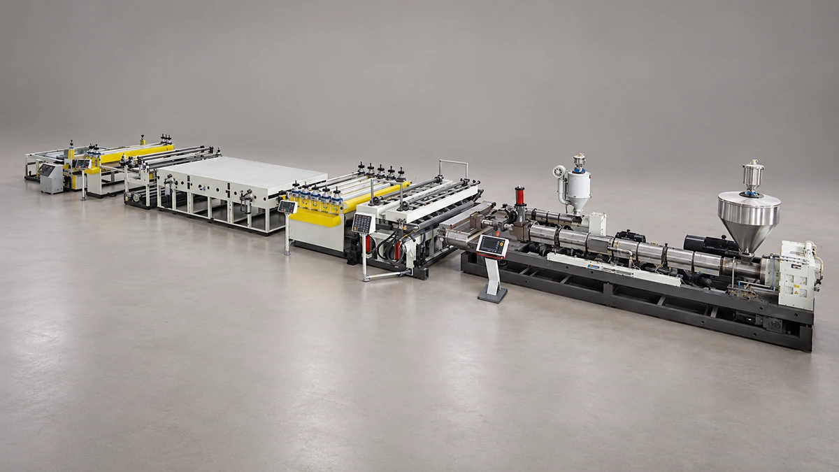 Sheet-processing line with an extruder, feed hopper, roller units and downstream equipment