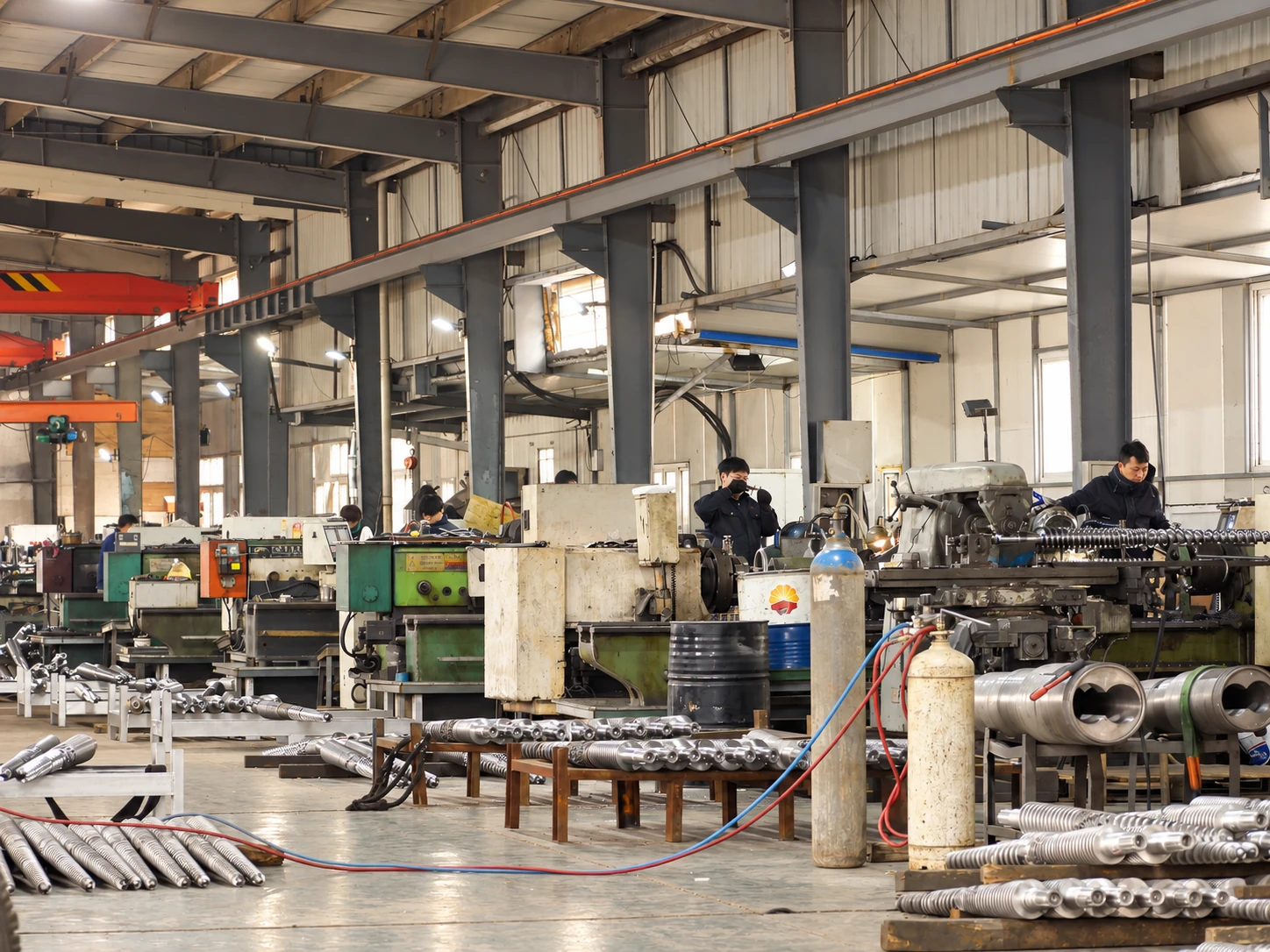 Skilled workers operating precision lathes